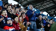 In this photo taken on Friday, March 27, 2020, young fans react during the Belarus Championship soccer match between Torpedo-BelAZ Zhodino and Belshina Bobruisk.