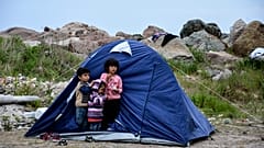 Virus Outbreak Greece Migrants