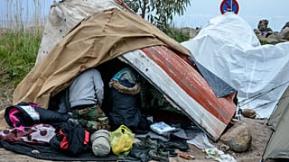 Virus Outbreak Greece Migrants