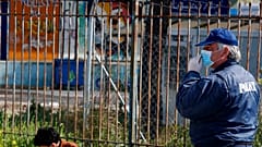 Virus Outbreak Greece Migrants