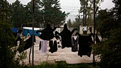 Virus Outbreak  Migrants
