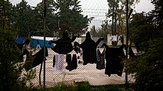Virus Outbreak  Migrants