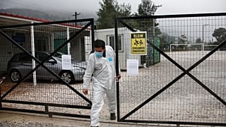Virus Outbreak Greece Migrants