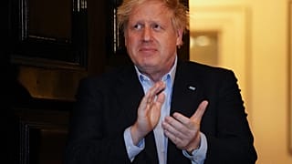 UK Prime Minister Boris Johnson participates in a national "clap for carers" to show thanks for health workers and medical staff during the coronavirus pandemic, April 2, 2020
