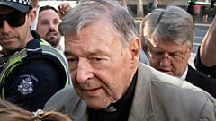 In this Feb. 27, 2019, file photo, Cardinal George Pell arrives at the County Court in Melbourne, Australia. 