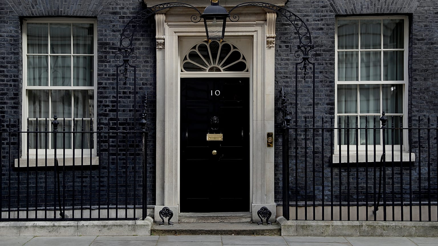 The closed door of 10 Downing Street as British Prime Minister Boris Johnson was moved to intensive care after his coronavirus symptoms worsened in London, April 7, 2020.