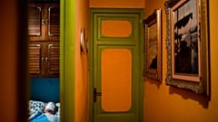 Enrique Pastor, 86, lies in bed as he waits for the doctor to examine him during a home medical visit. Pastor's usual caregiver tested positive for COVID-19. Barcelona, Spain