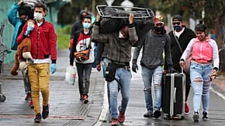 Migrantes venezuelanos regressam a casa a pé