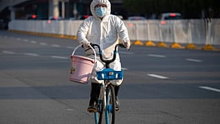 APTOPIX Virus Outbreak China Daily Life
