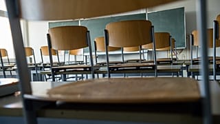 (FILES) This file photo taken on March 13, 2020 shows an empty classroom at a high school in Halle/Saale. (Photo by JENS SCHLUETER / AFP)