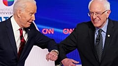 (US vice president Joe Biden (L) and Senator Bernie Sanders greet each other with a s