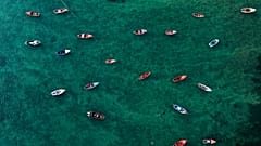 An aerial view shows fisher boats at the harbour in Sal Rei at Boa Vista island, Cape Verde, on January 06, 2020. (Photo by INA FASSBENDER / AFP)