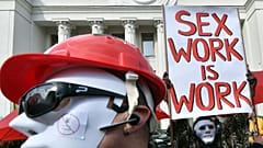 Sex workers wearing masks demonstrate in Ukraine for rights