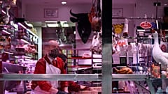 A butcher works in his shop in Paris, on April 16, 2020