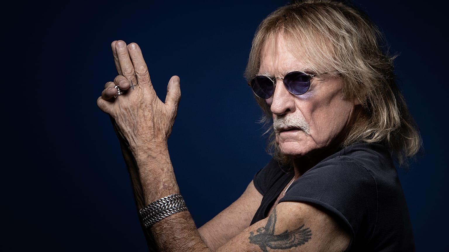 (FILES) In this file photo taken on December 11, 2019 French singer Christophe poses during a photo session in Paris. - Christophe died on April 16, 2020, aged 74. 