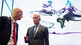 Daniel Koch of the Swiss Federal office of public health listens to Swiss Interior Minister Alain Berset 