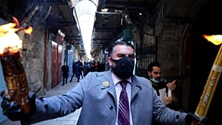 Coronavirus leaves Holy Sepulchre almost deserted on Saturday's Christian Orthodox Easter service