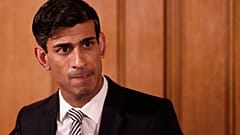 In this file photo dated Tuesday, March 17, 2020, Britain's Chancellor Rishi Sunak gives a press conference about the ongoing situation with the COVID-19