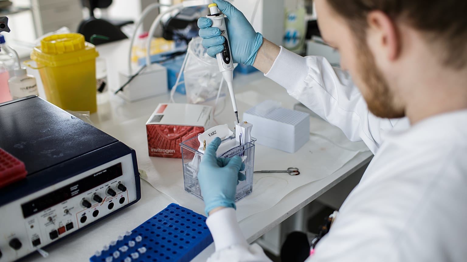A researcher works on a vaccin against the new coronavirus COVID-19 at the Copenhagen's University research lab in Copenhagen, Denmark, on March 23, 2020.