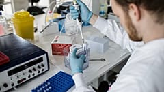 A researcher works on a vaccin against the new coronavirus COVID-19 at the Copenhagen's University research lab in Copenhagen, Denmark, on March 23, 2020.