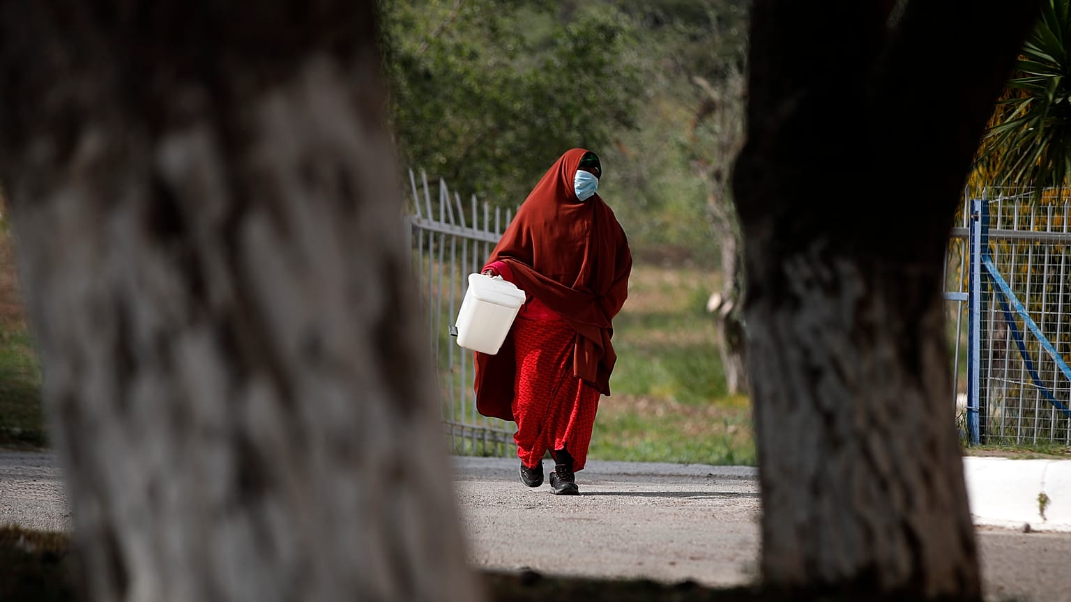 Virus Outbreak Greece Migrants