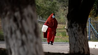 Virus Outbreak Greece Migrants