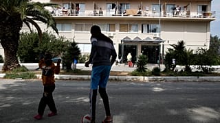 Virus Outbreak Greece Migrants