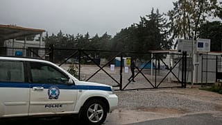 Virus Outbreak Greece Migrants