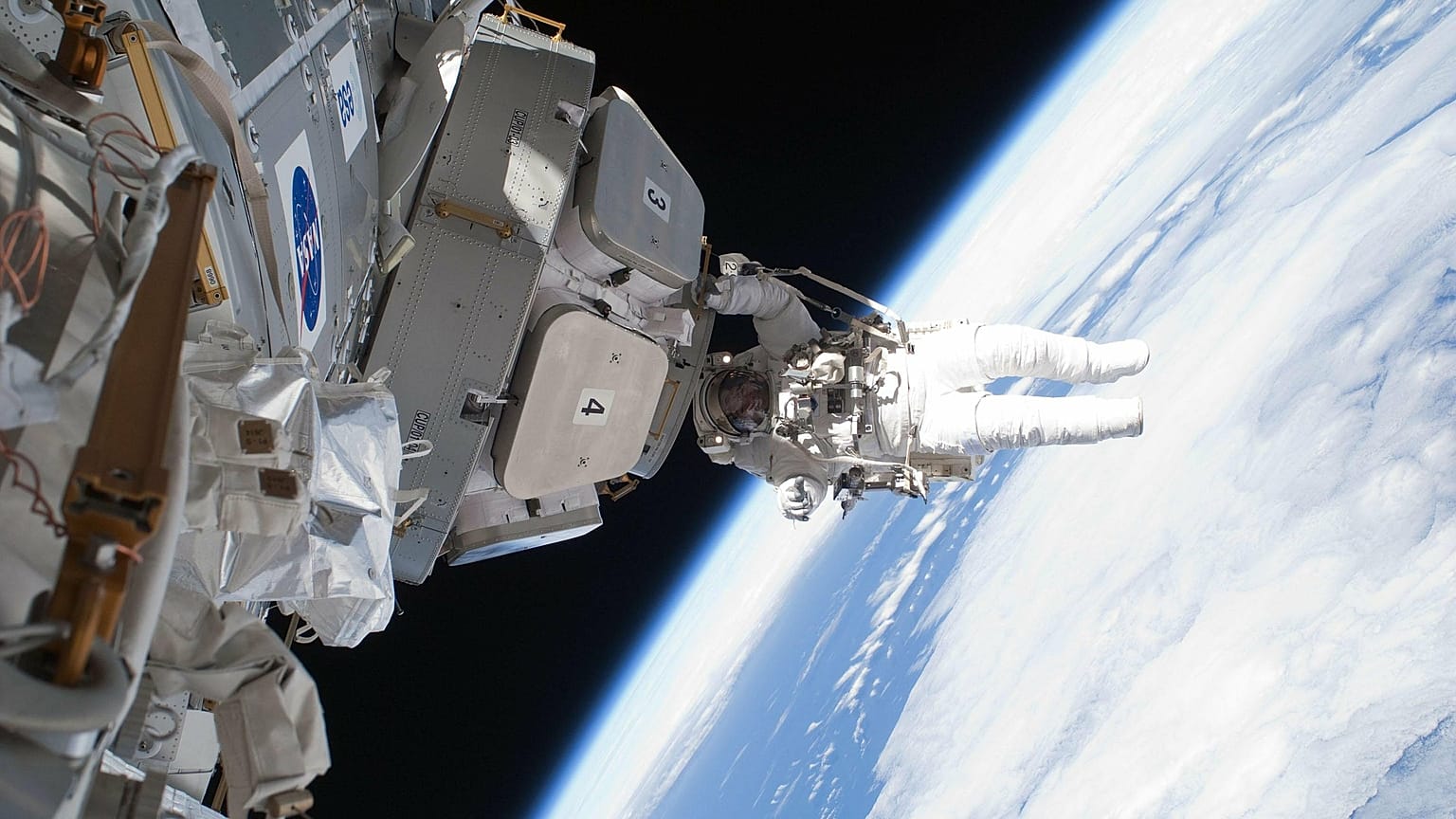 Astronauts on a space walk.