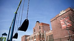 Swings sit empty on a playground outside Achievement First charter school Saturday, March 7, 2020, in Providence, Rhode Island, US
