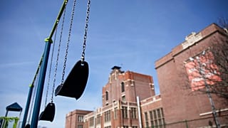Swings sit empty on a playground outside Achievement First charter school Saturday, March 7, 2020, in Providence, Rhode Island, US