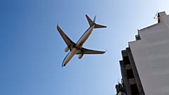 In this file photo dated Aug. 21, 2019, a KLM passenger plane approaches for landing at Lisbon airport. 