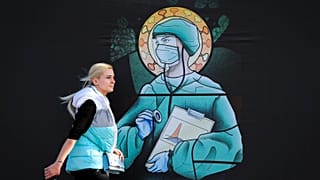 APTOPIX Virus Outbreak Romania Religion