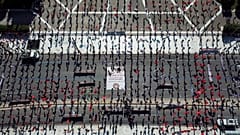 This photo provided by the communist party-affiliated PAME union shows social distancing practised during a May Day rally outside the Greek Parliament, Athens, May 1, 2020.