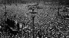 Huge crowds cram into Whitehall and Parliament Square, central London, to hear Prime Minister Winston Churchill announce the end of the war in Europe. May 8, 1945.