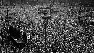 Huge crowds cram into Whitehall and Parliament Square, central London, to hear Prime Minister Winston Churchill announce the end of the war in Europe. May 8, 1945.