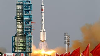 FILE: In this file photo taken Saturday, June 16, 2012, a Shenzhou 9 spacecraft Long March rocket with 3 astronauts including China's first female astronaut launches