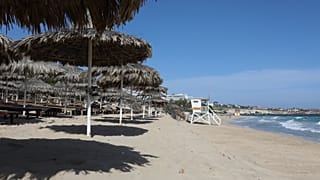A deserted beach is pictured in the Cypriot resort town of Ayia Napa on May 4, 2020, as the island country gradually eases its lockdown restrictions