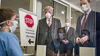 Hesse's State Premier Volker Bouffier (3rd R), on April 14, 2020, amid the novel coronavirus / COVID-19 pandemic.