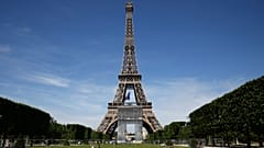 French soldiers patrol next to the Eiffel Tower on May 8, 2020 in Paris, as part of the celebrations for the anniversary of the Allied forces victory in Europe in WW2