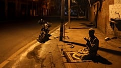 A Muslim worshipper offers prayer on a street outside the Jama Masjid on the first day of Ramadan during a nationwide lockdown, in New Delhi, India, Saturday, April 25, 2020