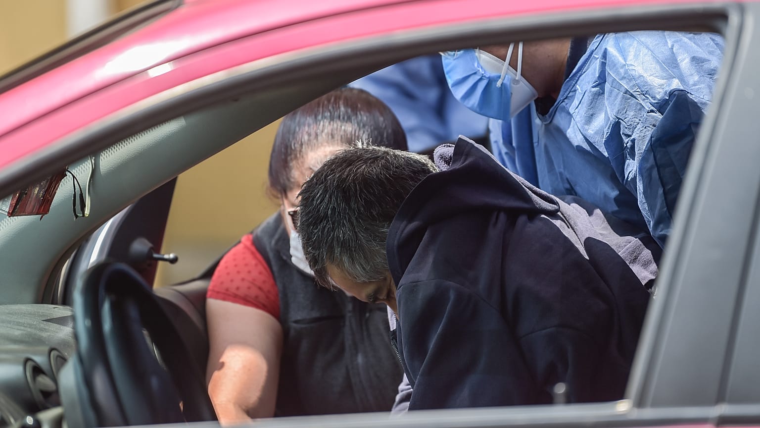 A man with symptoms of Covid-19 arrives at the triage area of the General Hospital in Mexico City on May 9, 2020. (Photo by PEDRO PARDO / AFP)