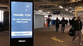 Commuters in London as the lockdown is loosened