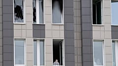 Virus Outbreak Russia Fire