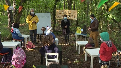 Children have lessons in woods as parents protest school not reopening