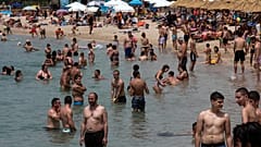 Virus Outbreak Greece Beaches