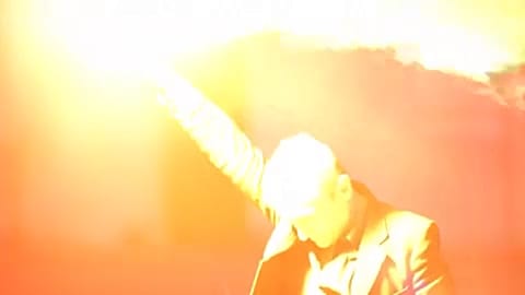 Artist lights SOS flares to mark Day of Light