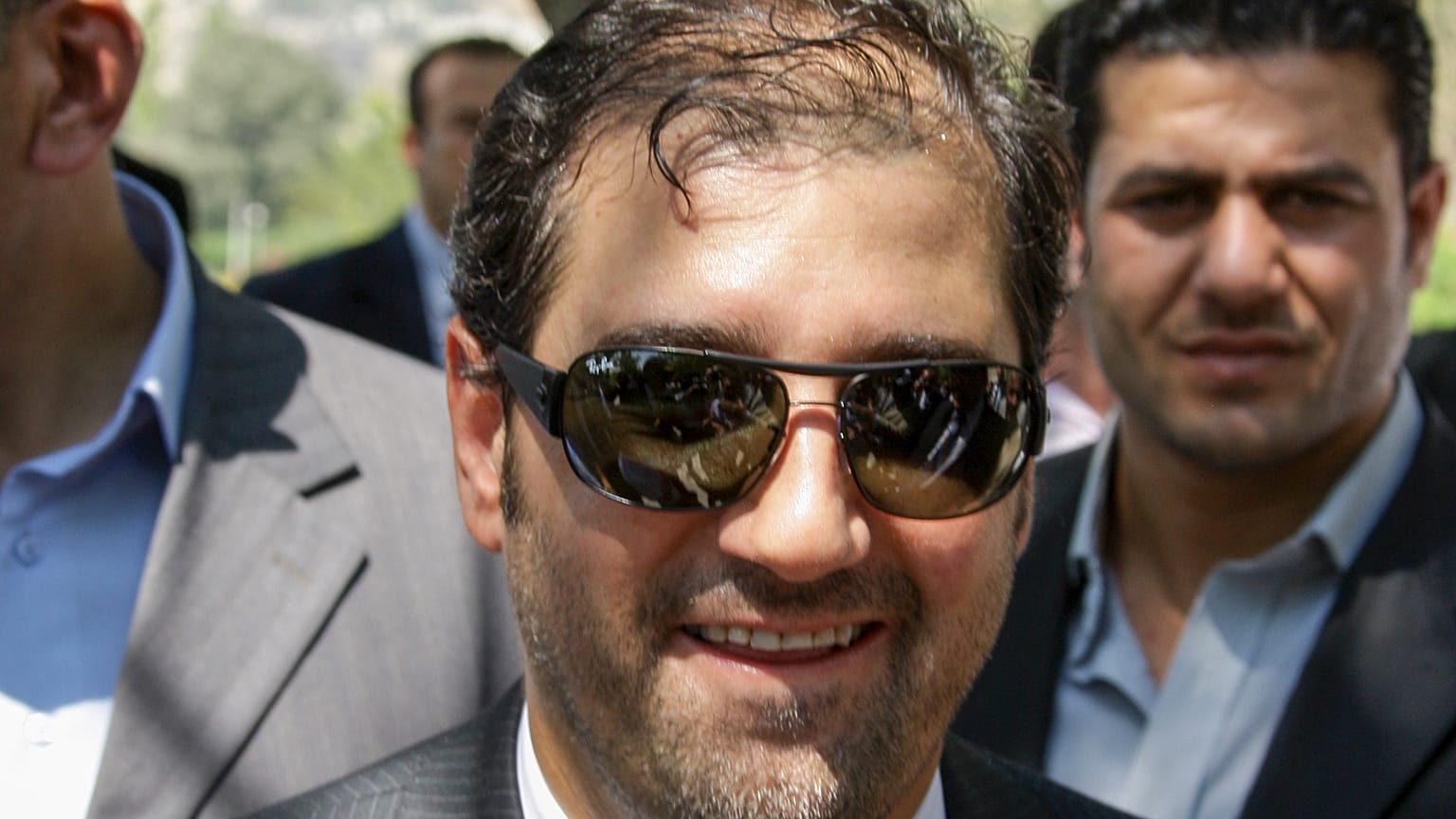 رامي مخلوف مشاركاً في احتفال أقيم بمناسبة الذكرى ��لعاشرة لتسلم الأسد السلطة في دمشق في عام 2010 (أرشيف) 