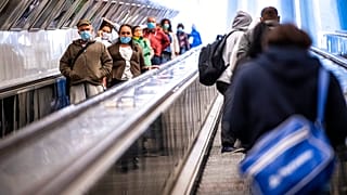 Passengers in a metro station, Budapest, April 27, 2020.