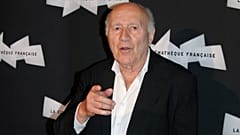 French actor Michel Piccoli gestures as he poses for photographers, during a retrospective of his career, in Paris, Wednesday, Sept. 4, 2013. (AP Photo/Thibault Camus)